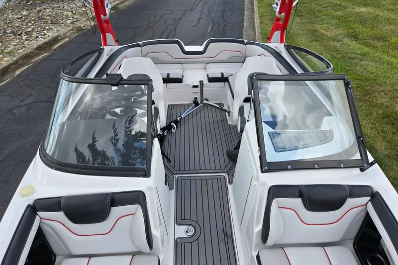 Slide: The Image of 2018 Yamaha Boats 212X interior with sleek seating and modern design. - 21