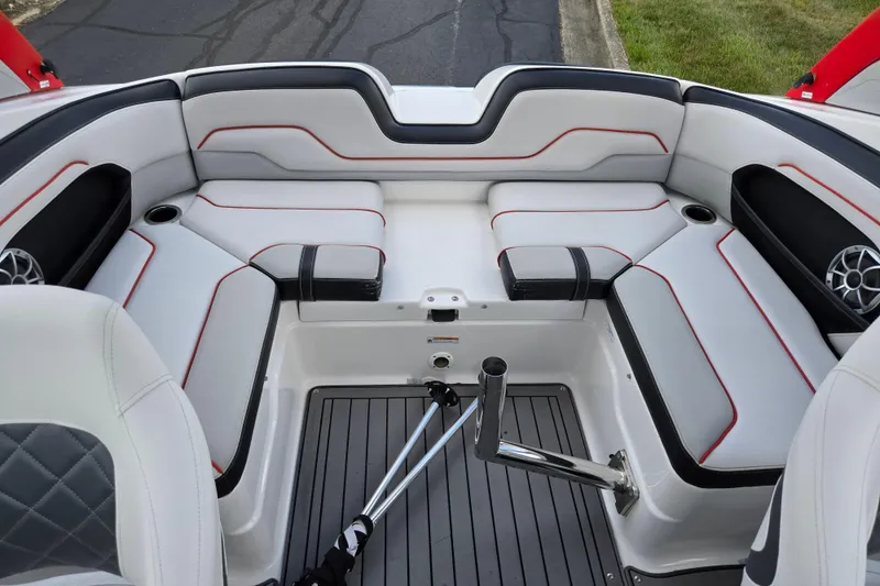 Slide: The Image of 2018 Yamaha Boats 212X interior with sleek seating and modern design. - 23