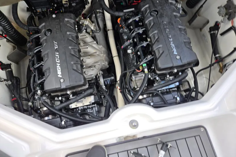 Slide: The Image of 2018 Yamaha Boats 212X engine compartment with dual high-output engines. - 25