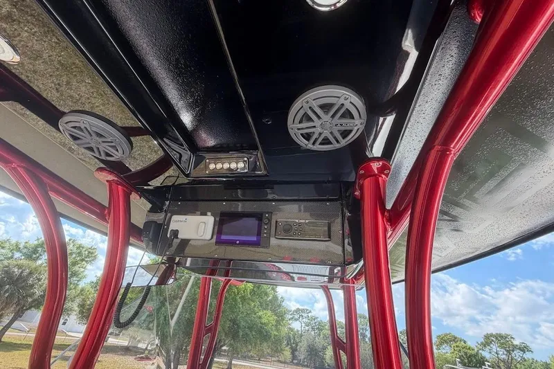 Slide: The Image of 2018 Statement 380 Open boat interior with red framework and audio system. - 23