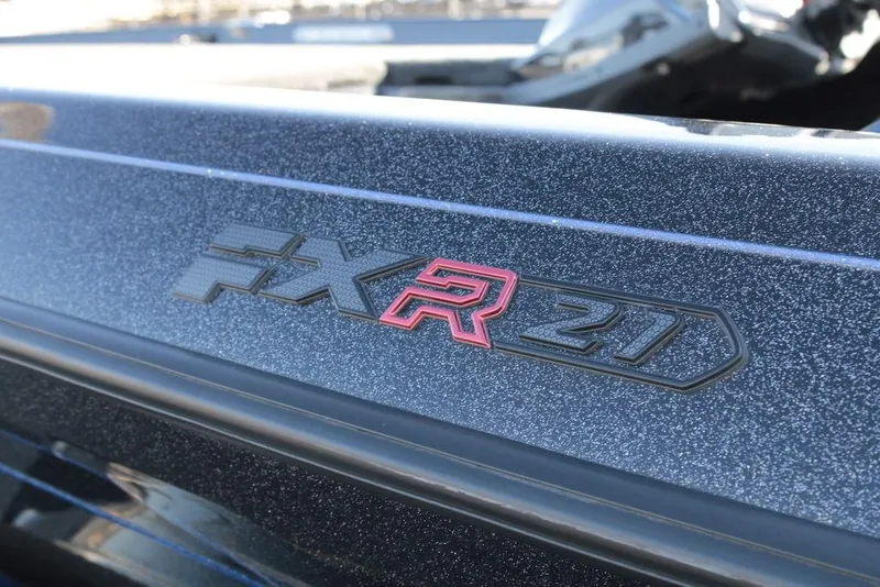 Slide: The Image of 2025 Skeeter FXR21 Limited boat logo on metallic surface. - 18