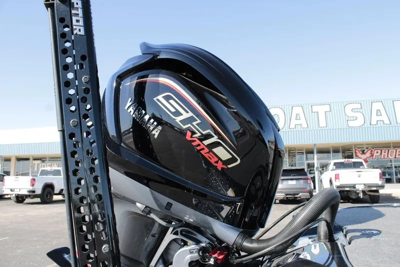 Slide: The Image of 2025 Skeeter FXR21 Limited with Yamaha VMAX engine at boat dealership. - 19