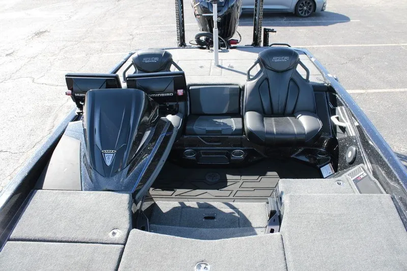 Slide: The Image of 2025 Skeeter FXR21 Limited boat interior with dual Humminbird displays and sleek seating. - 3