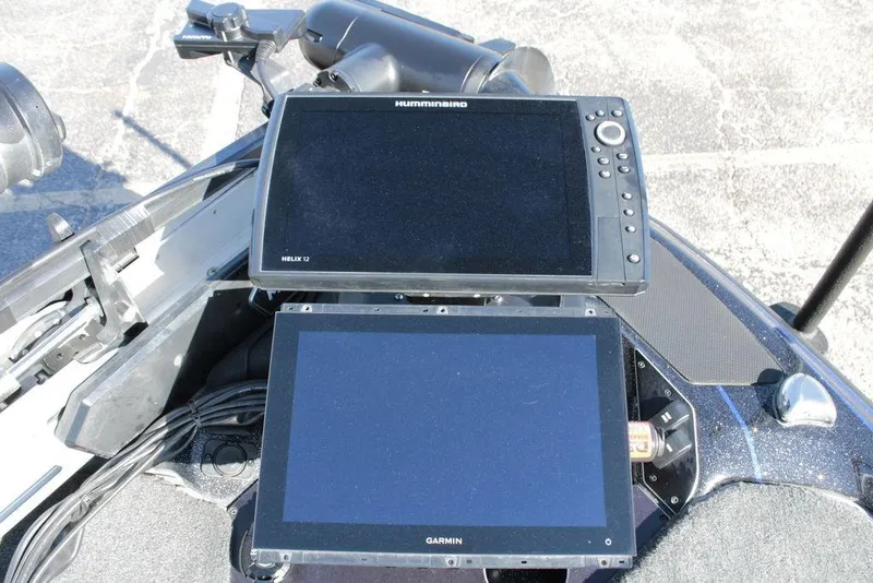 Slide: The Image of 2025 Skeeter FXR21 Limited boat with Humminbird and Garmin navigation displays. - 6