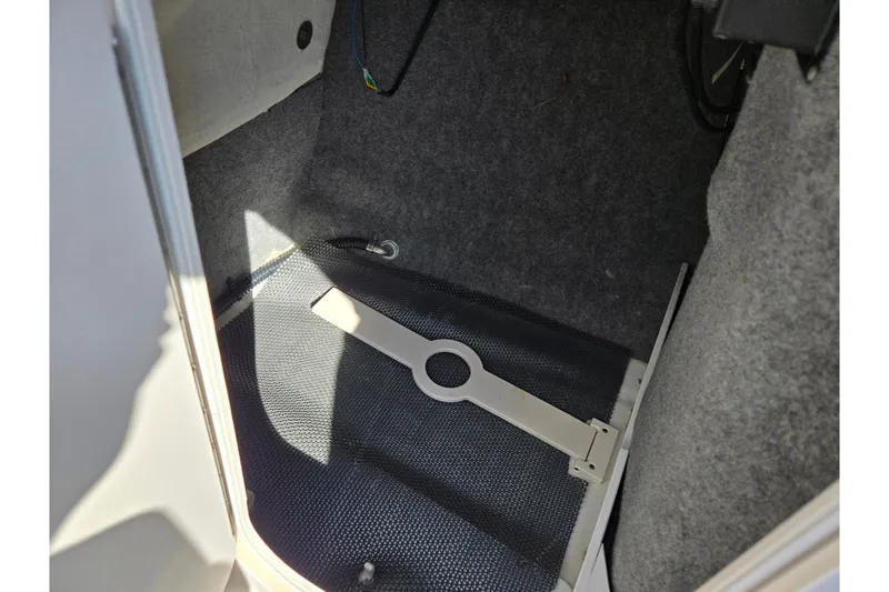 Slide: The Image of Interior storage compartment of 2018 Chaparral Vortex 223 VR boat. - 17