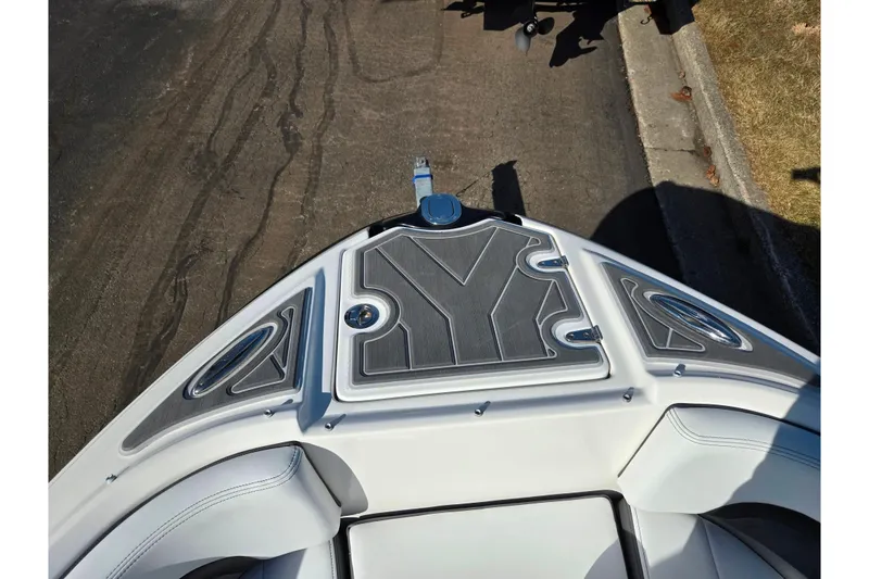 Slide: The Image of 2018 Chaparral Vortex 223 VR boat bow with sleek design and modern detailing. - 19