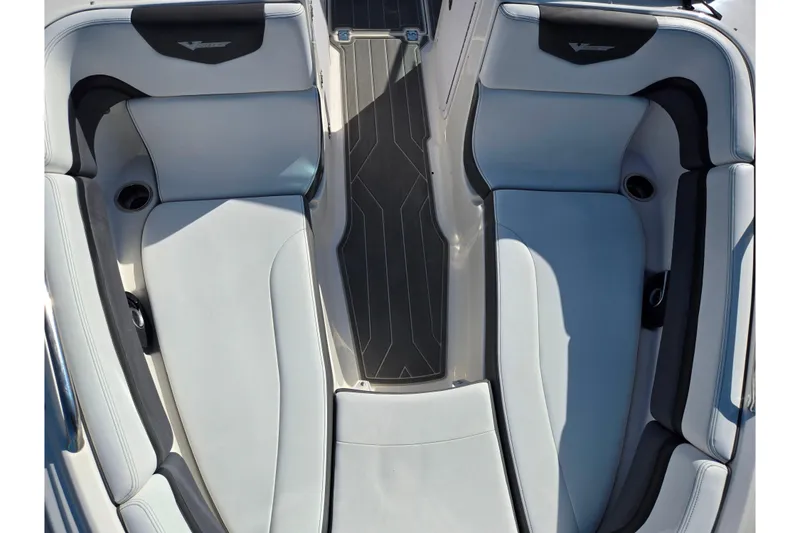 Slide: The Image of 2018 Chaparral Vortex 223 VR boat interior with sleek seating and modern design. - 20