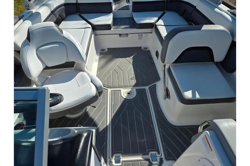 Slide: The Image of 2018 Chaparral Vortex 223 VR boat interior with sleek seating and modern design. - 22