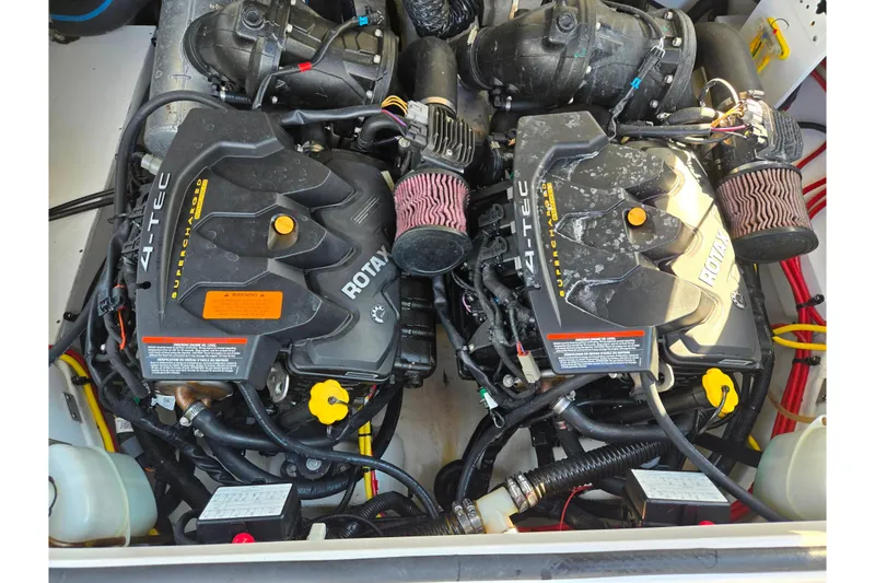 Slide: The Image of 2018 Chaparral Vortex 223 VR engine compartment with dual Rotax 4-TEC engines. - 24