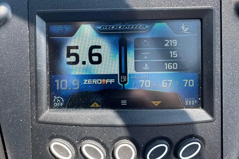 Slide: The Image of Dashboard display of a 2019 Moomba Helix boat showing speed and ballast settings. - 2