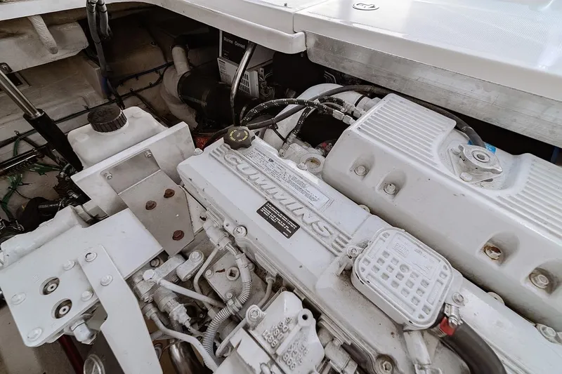Slide: The Image of Engine compartment of a 2008 Sea Ray 440 Sundancer with Cummins engine. - 24