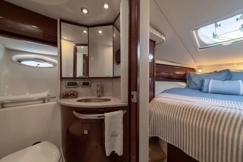 Slide: The Image of Luxurious interior of 2008 Sea Ray 440 Sundancer yacht with bathroom and cozy bedroom. - 20