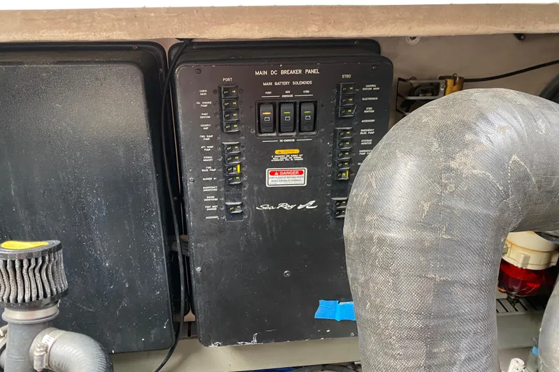 Slide: The Image of Electrical panel of a 2004 Sea Ray 380 Sundancer boat engine room. - 11