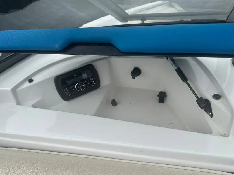 Slide: The Image of Interior of a 2016 Tigé R20 boat with stereo system. - 26