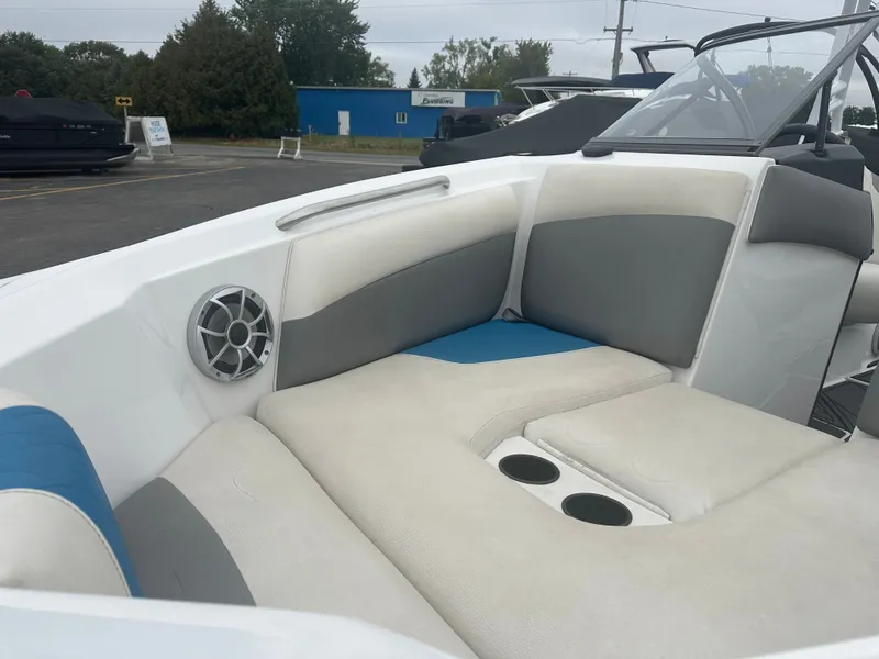 Slide: The Image of Interior of a 2016 Tigé R20 boat with gray and blue seating. - 28
