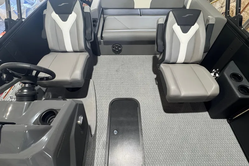 Slide: The Image of Interior of 2026 Evotti 521CS boat with modern seating and steering console. - 4
