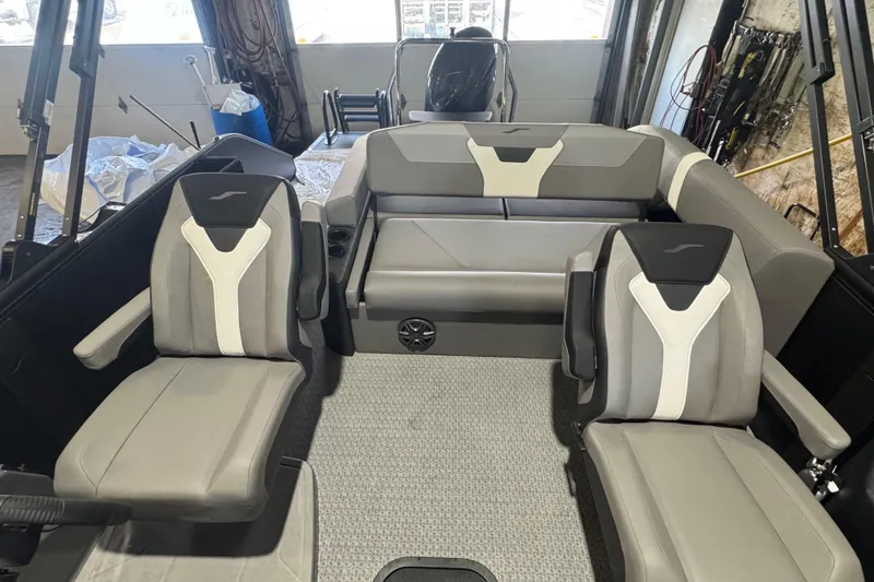 Slide: The Image of 2026 Evotti 521CS boat interior with modern gray seating and sleek design. - 7