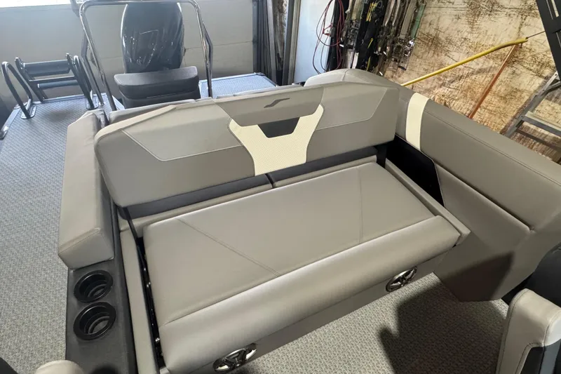 Slide: The Image of Luxurious interior of 2026 Evotti 521CS boat with sleek seating and cup holders. - 8