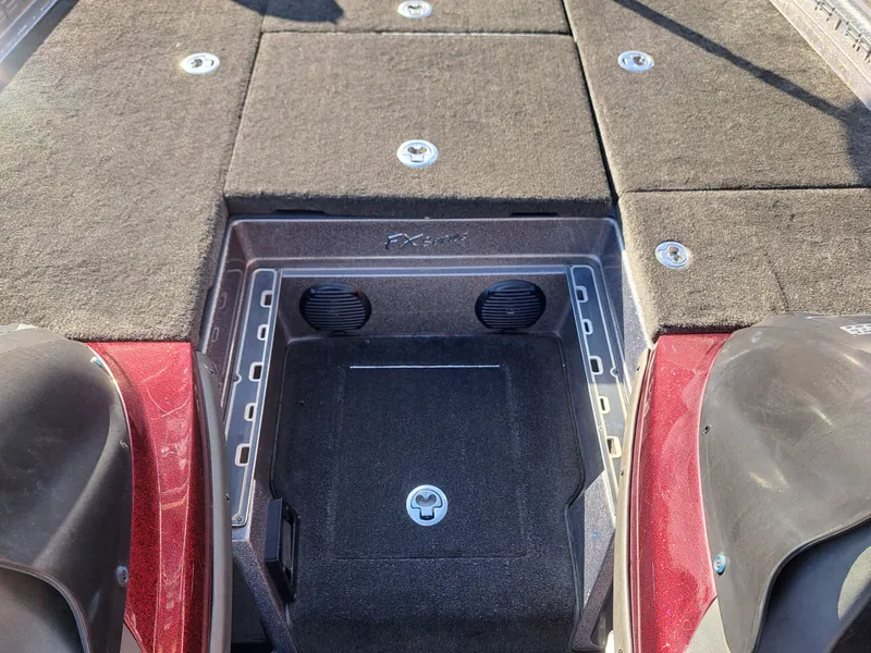 Slide: The Image of 2014 Skeeter FX21 boat deck with storage compartment. - 21