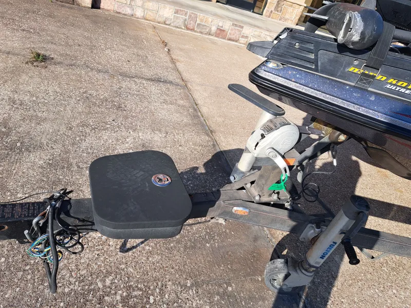 Slide: The Image of 2014 Skeeter FX21 boat trailer on concrete surface. - 34