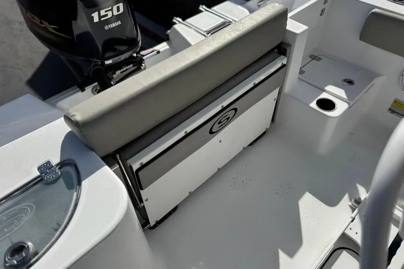 Slide: The Image of 2022 Sportsman Open 212 Center Console boat interior with Yamaha 150 engine. - 24