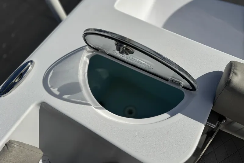 Slide: The Image of Open livewell on 2022 Sportsman Open 212 Center Console boat. - 25