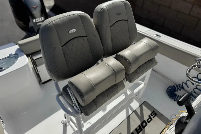 Slide: The Image of 2022 Sportsman Open 212 Center Console boat seats with diamond stitching and dual backrests. - 27
