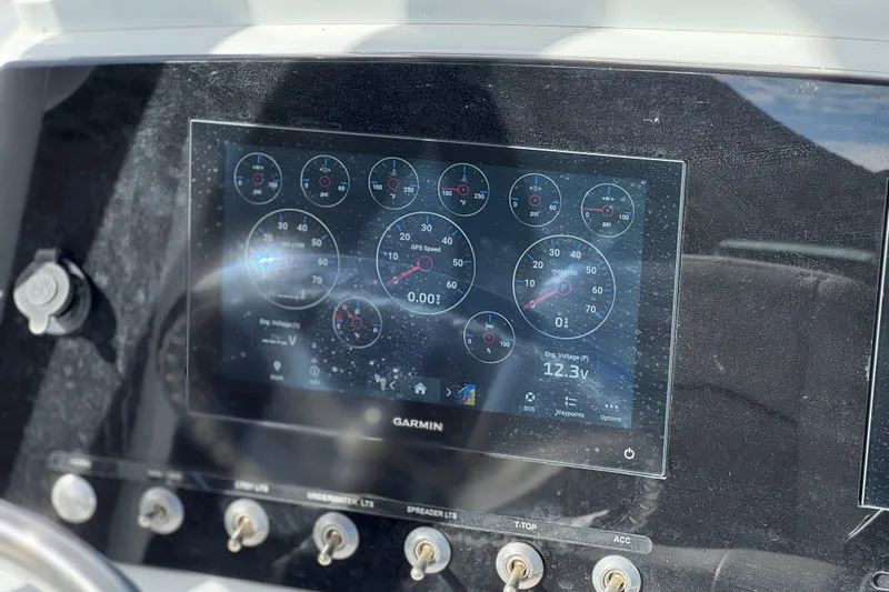 Slide: The Image of Garmin display on 2022 Sportsman Open 212 Center Console boat dashboard. - 30