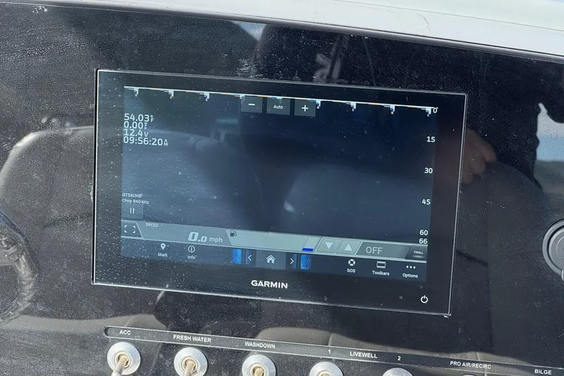 Slide: The Image of Garmin display on 2022 Sportsman Open 212 Center Console boat dashboard. - 31