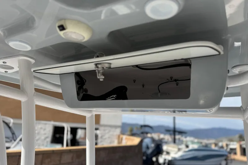 Slide: The Image of 2022 Sportsman Open 212 Center Console boat interior detail with mounted equipment. - 43
