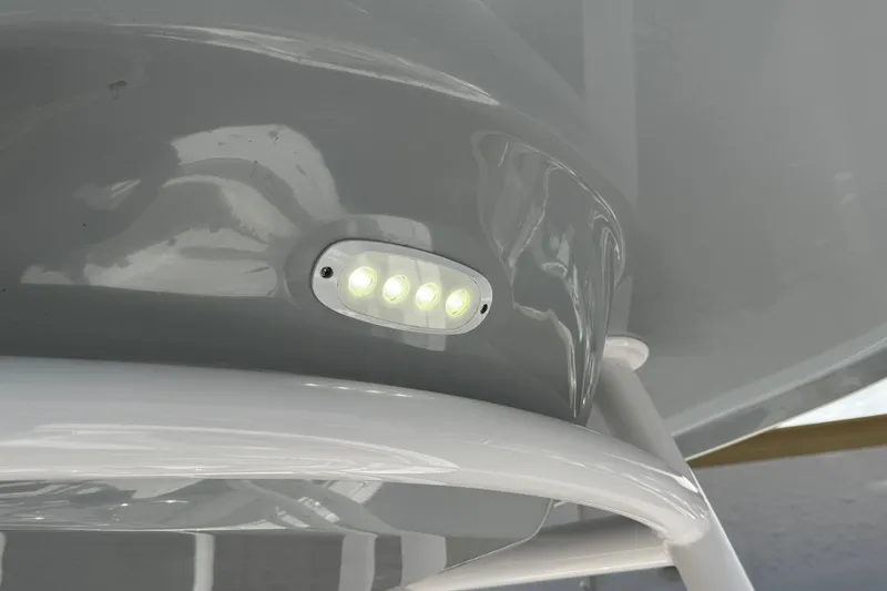 Slide: The Image of LED light on 2022 Sportsman Open 212 Center Console boat's underside. - 44