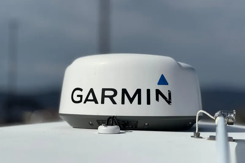 Slide: The Image of Garmin radar on 2022 Sportsman Open 212 Center Console boat, close-up view. - 45