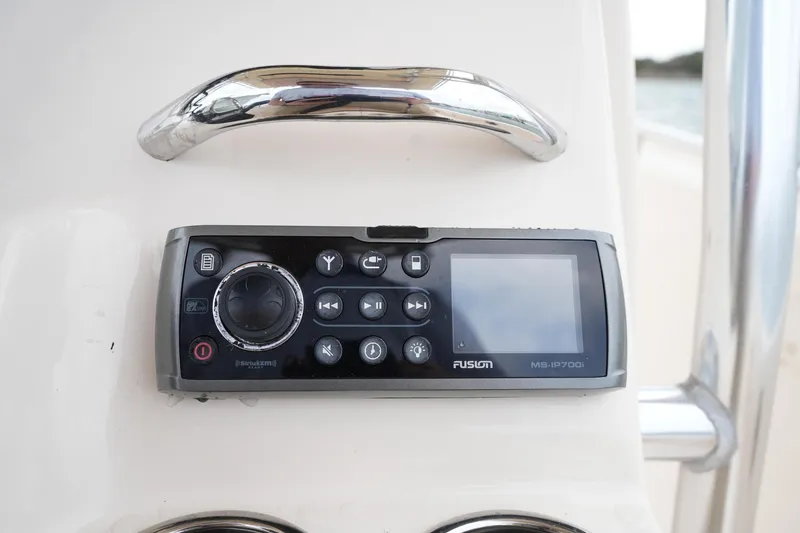 Slide: The Image of Fusion MS-IP700i marine stereo on 2014 Grady-White Fisherman 209 boat console. - 23
