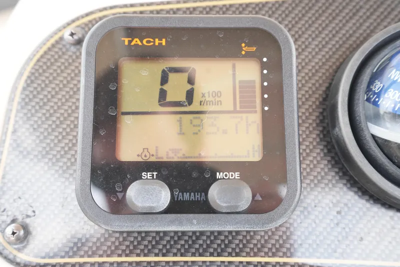 Slide: The Image of Tachometer display on 2014 Grady-White Fisherman 209 boat dashboard. - 28