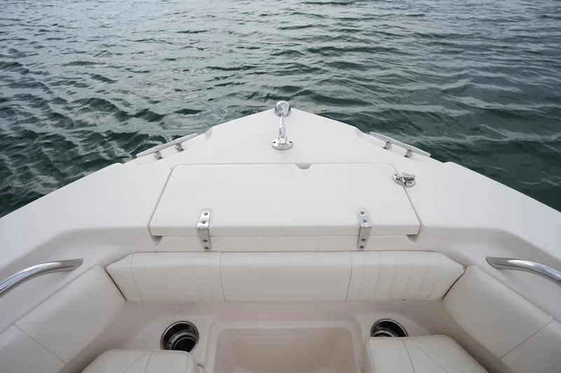 Slide: The Image of 2014 Grady-White Fisherman 209 boat bow with seating, on calm water. - 34