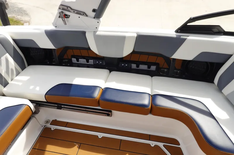 Slide: The Image of 2022 Malibu Wakesetter 23 MXZ interior seating with modern design and premium upholstery. - 23