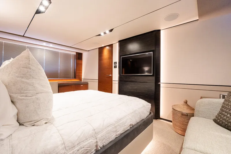 Slide: The Image of Luxurious bedroom interior of 2019 Princess S78 yacht with modern design and cozy furnishings. - 14