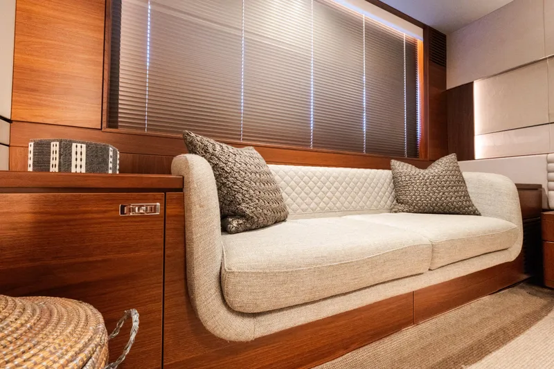 Slide: The Image of Luxurious interior of 2019 Princess S78 yacht with elegant sofa and wooden accents. - 15