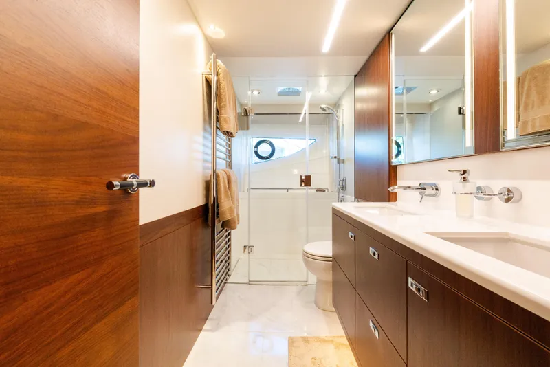 Slide: The Image of Luxurious bathroom in 2019 Princess S78 yacht with modern fixtures and wooden accents. - 17