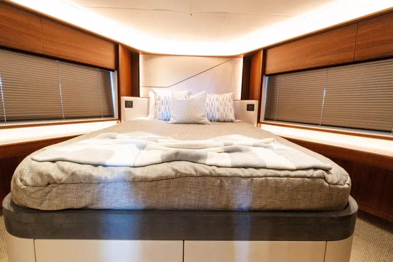 Slide: The Image of Luxurious bedroom interior of 2019 Princess S78 yacht with modern design and cozy bedding. - 18