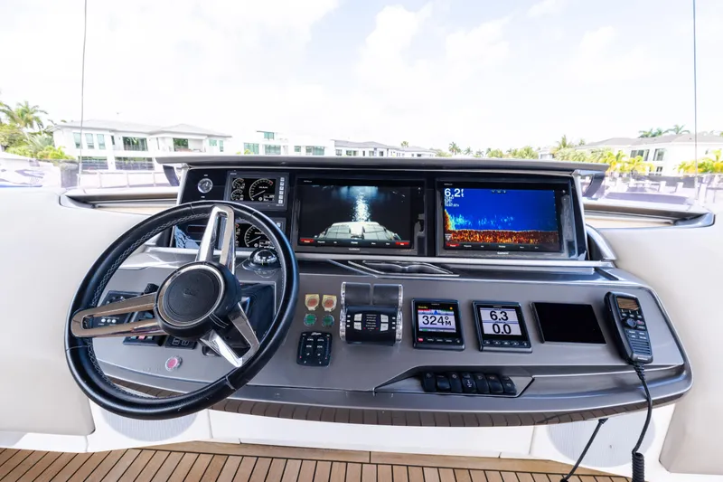 Slide: The Image of Cockpit of 2019 Princess S78 yacht with advanced navigation displays and controls. - 29