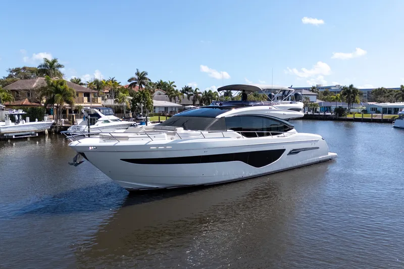 Slide: The Image of Luxurious 2019 Princess S78 yacht cruising on a sunny day in a scenic marina. - 40
