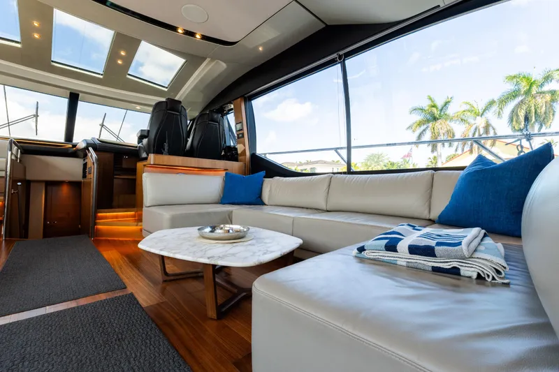 Slide: The Image of Luxurious interior of 2019 Princess S78 yacht with elegant seating and panoramic windows. - 9