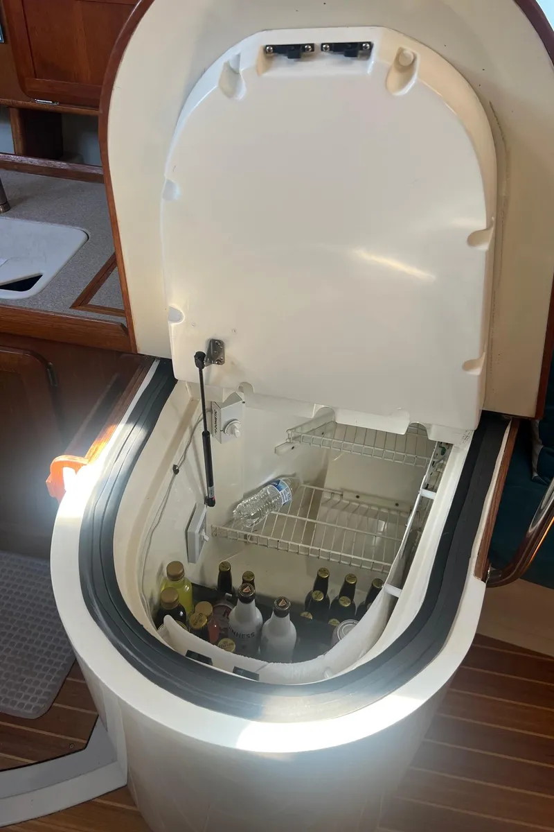 Slide: The Image of Open boat fridge with drinks inside, aboard a 1992 Hunter 43 yacht. - 10