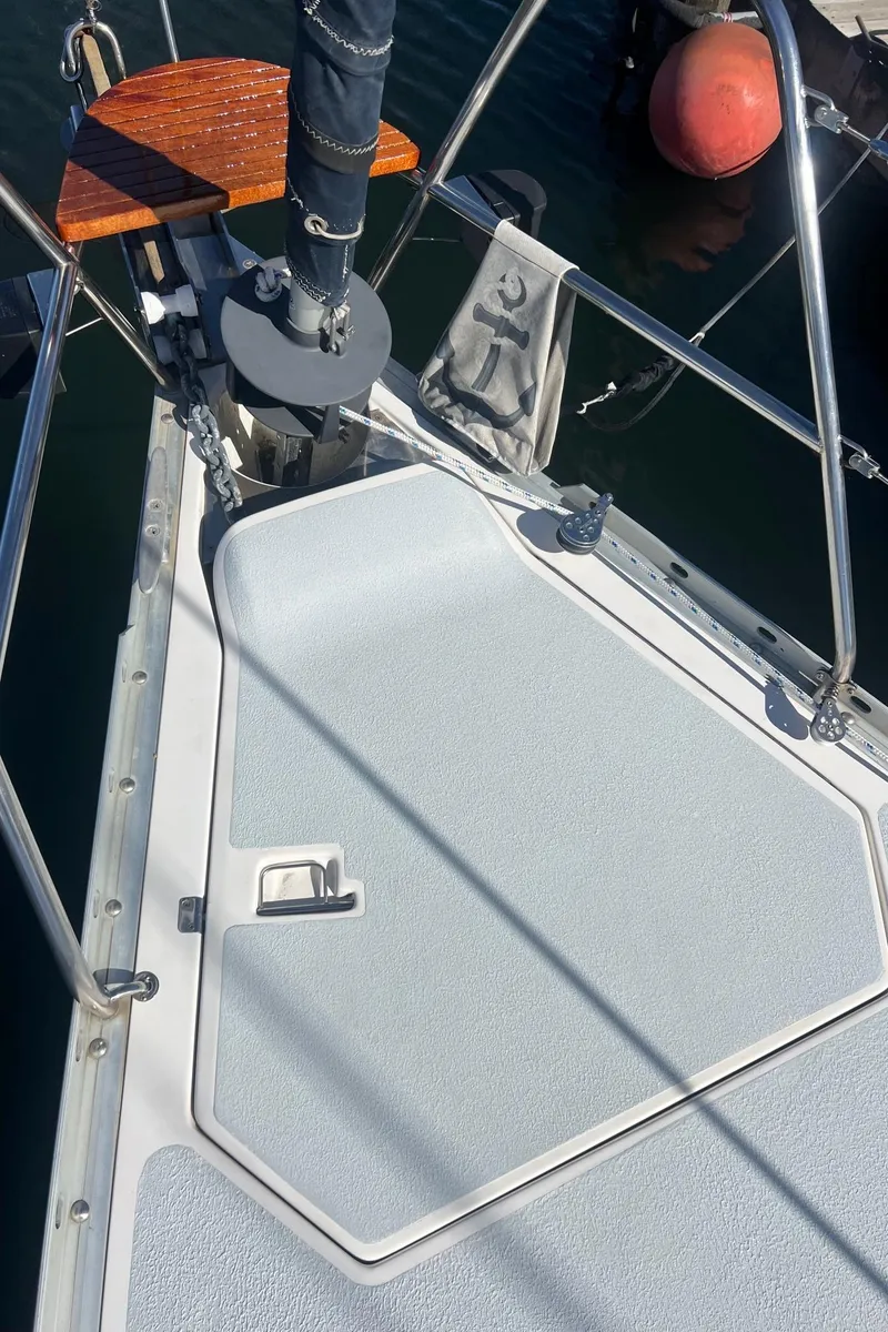 Slide: The Image of Deck of 1992 Hunter 43 sailboat with anchor and mooring lines. - 29
