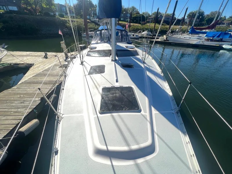 Slide: The Image of Sailboat docked at marina, Hunter 43 model, 1992, sunny day. - 31