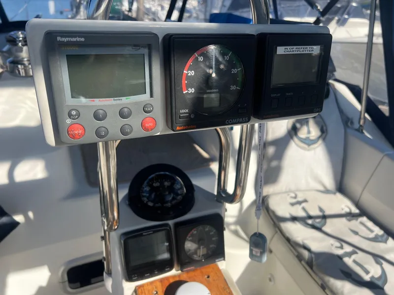 Slide: The Image of Sailboat cockpit with navigation instruments, Hunter 43, 1992 model. - 42
