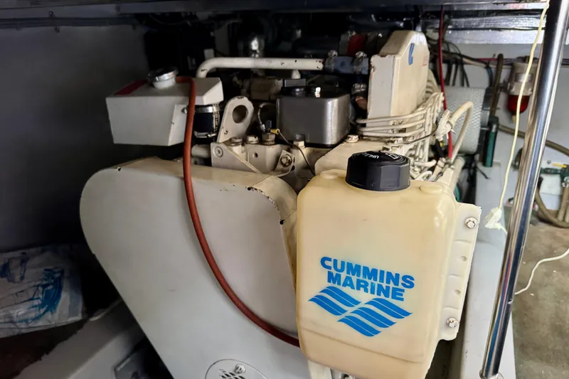Slide: The Image of 1989 Mediterranean 38 boat engine with Cummins Marine components in engine room. - 22