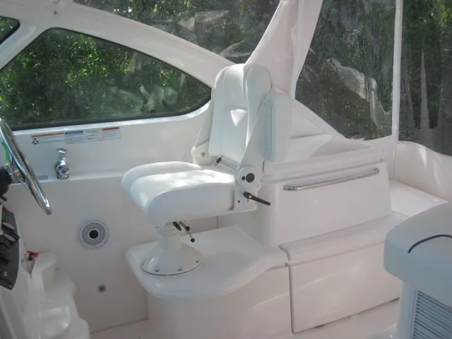 Slide: The Image of Interior of 2012 Tiara Yachts 3900 Open with white seating. - 11