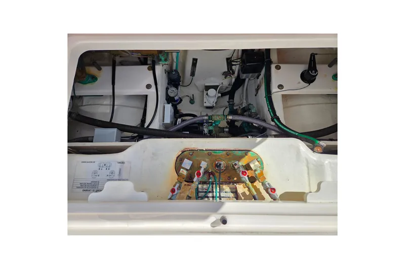 Slide: The Image of Engine compartment of a 2012 Tiara Yachts 3900 Open, showcasing mechanical components. - 30